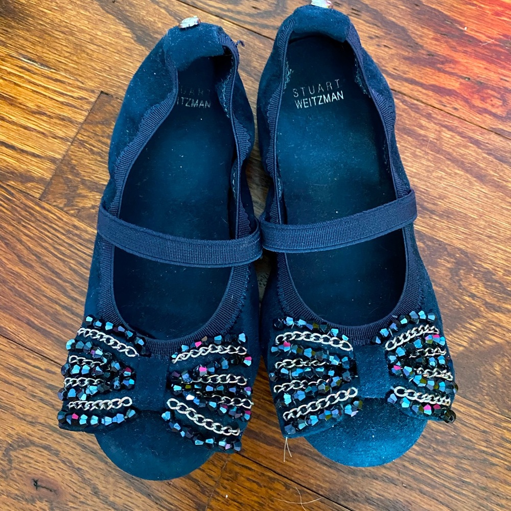 Girls navy blue Fiona bow flat by Stuart Weitzman.  Elastic strap and beaded bow